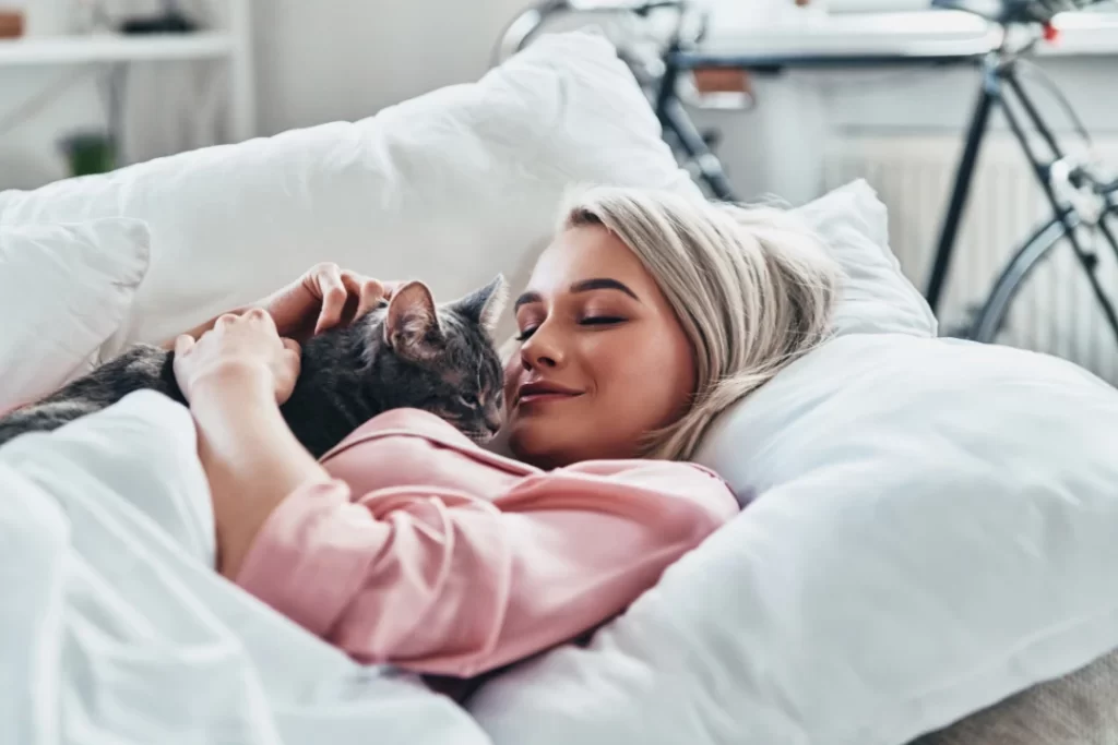 Relax Young woman with her cat.