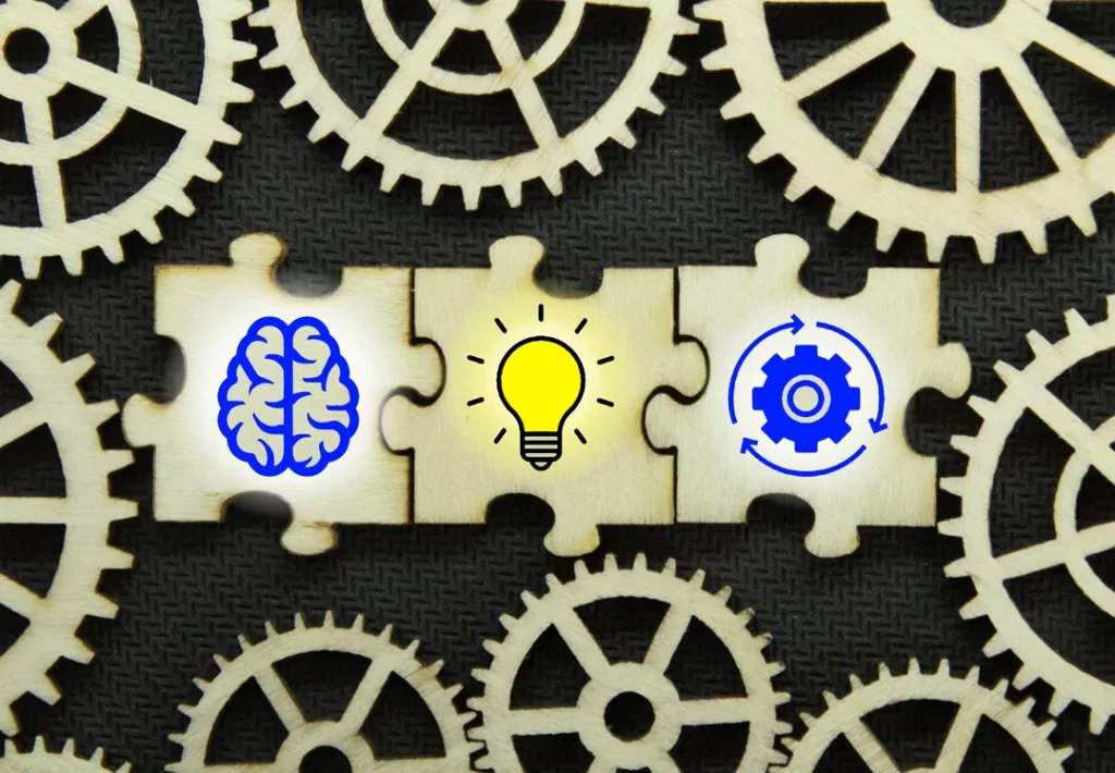 puzzle with brain idea and management icons.