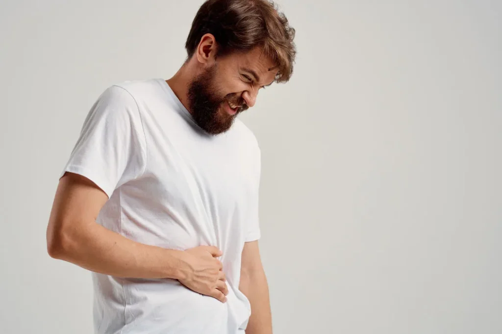 A man having pain in his stomach.