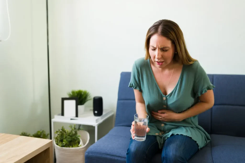 Woman suffering from acid flux.