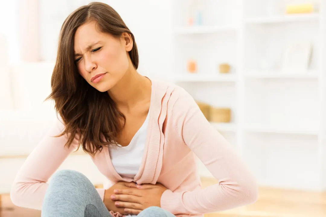 Woman suffering from acid Flux