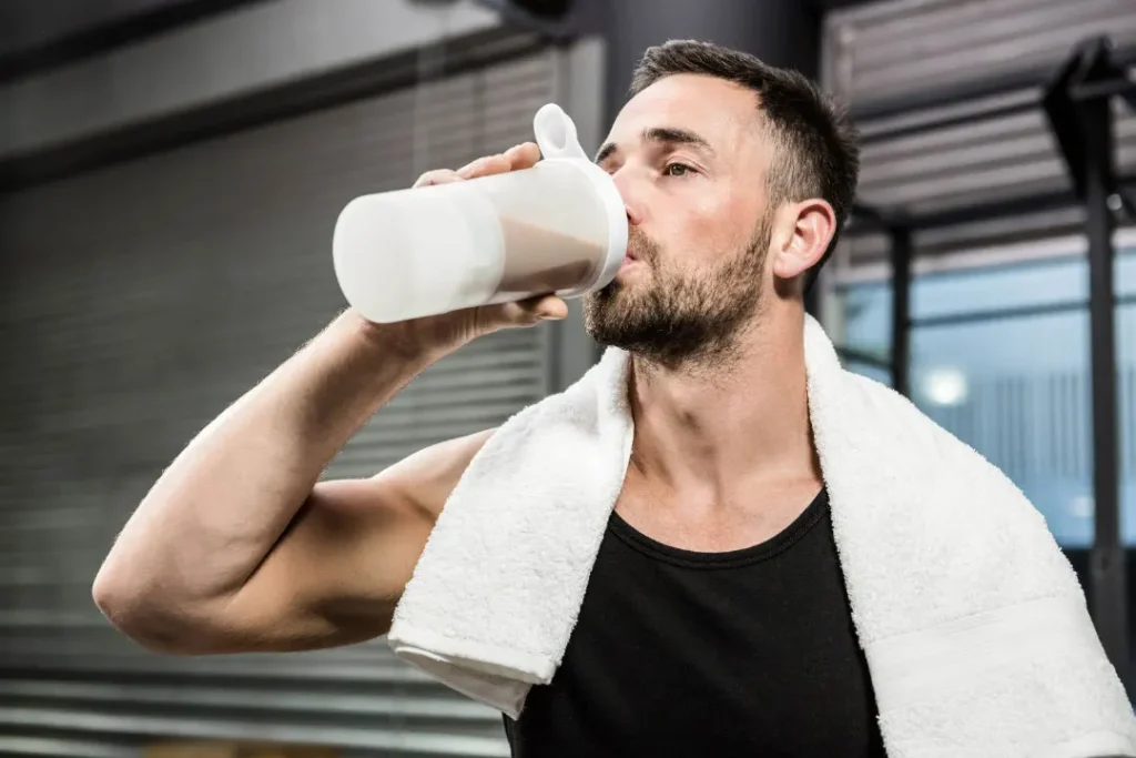 Man drinking protein shake.