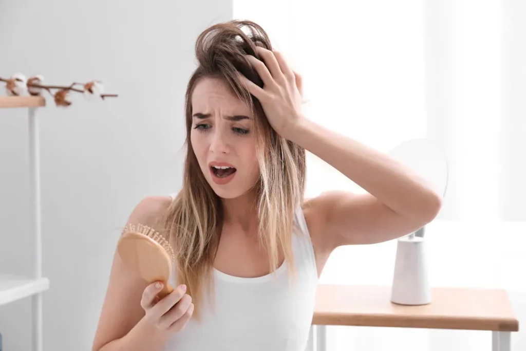 Lady facing hair fall.