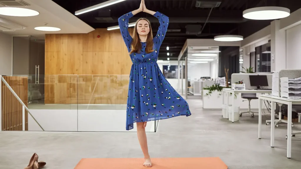 A lady doing yoga.